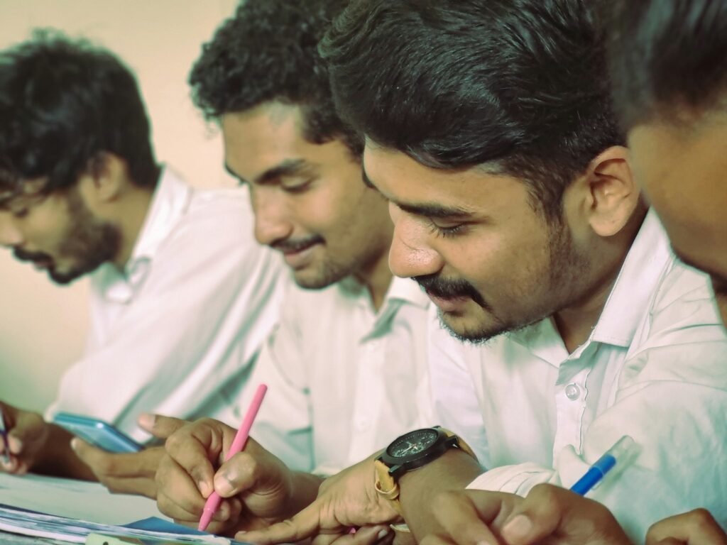 Senior secondary students taking notes during a Maths class